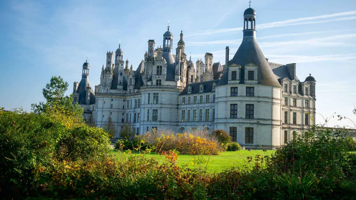 Double helix staircase and roof terraces of Chateau de Chambord on a guided Loire Valley castle tour