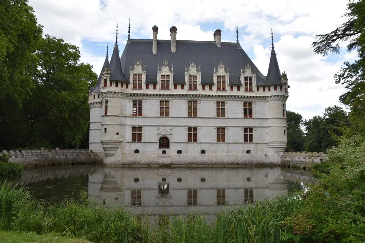 Château d'Azay-le-Rideau reflected in the Indre on a Loire Valley castles tour