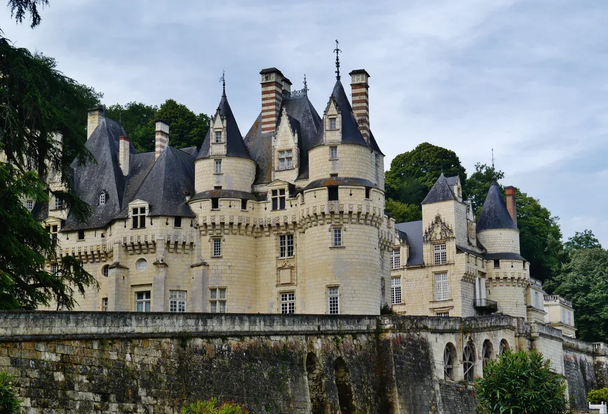 Château d'Ussé turrets above the terrace wall on a Loire Valley castles tour